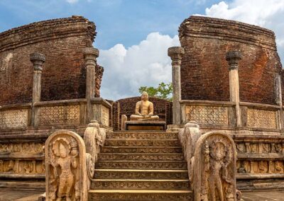The ancient Buddha statue, and the ruins at the Sacred Quadrangle, from the Kingdom of Polonnaruwa