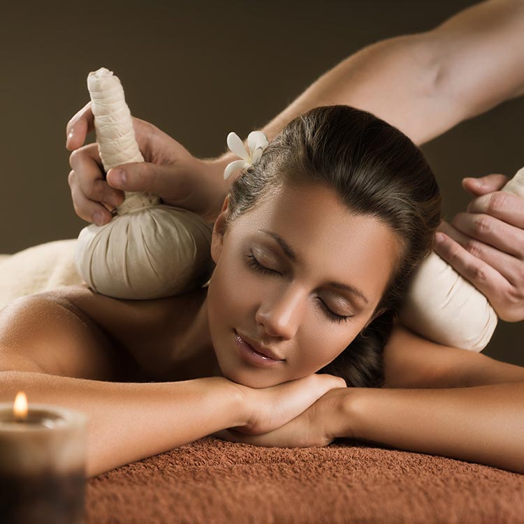A Lady Experiencing the Delight of Ayurveda Therapies at an Ayurvedic Spas