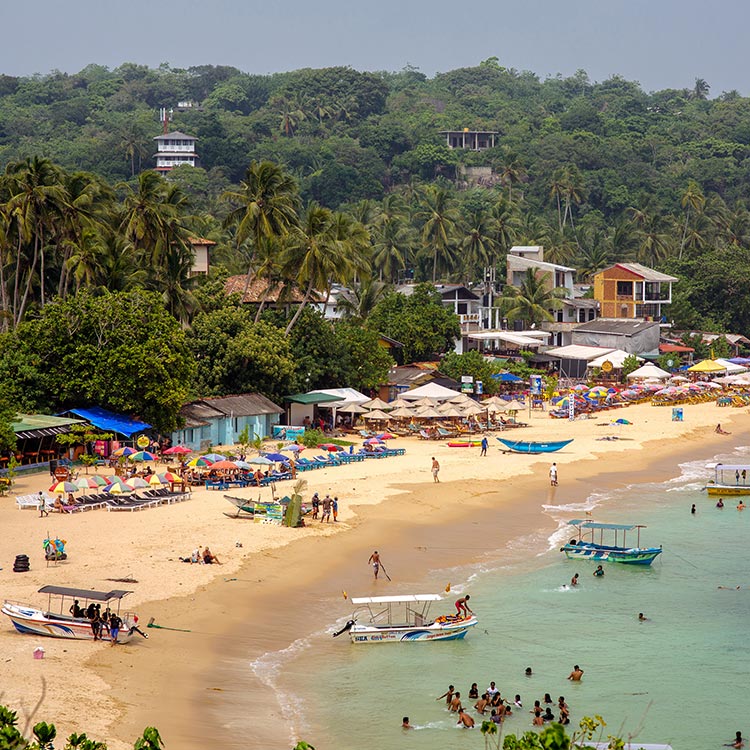 Crowds enjoying at the Unawatuna Beach in Sri Lanka