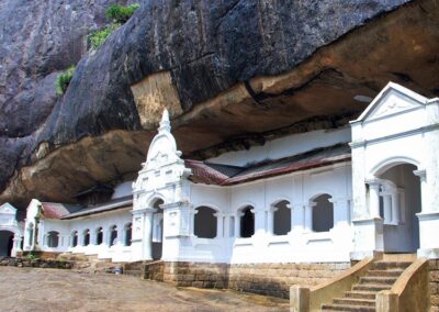 The White Ancient Buildings by the rocky cave at the Dambulla Cave Temple