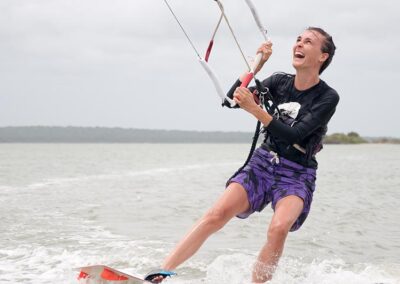 A Young Foreign girl kitesurfing in Sri Lanka