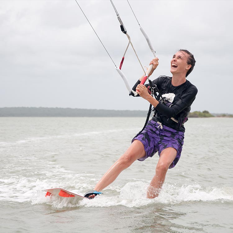 A Young Foreign girl kitesurfing in Sri Lanka