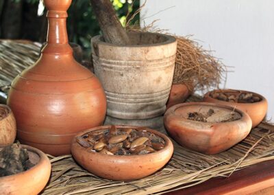 A Collection of pots and bowls that contain Ayurvedic Medicine