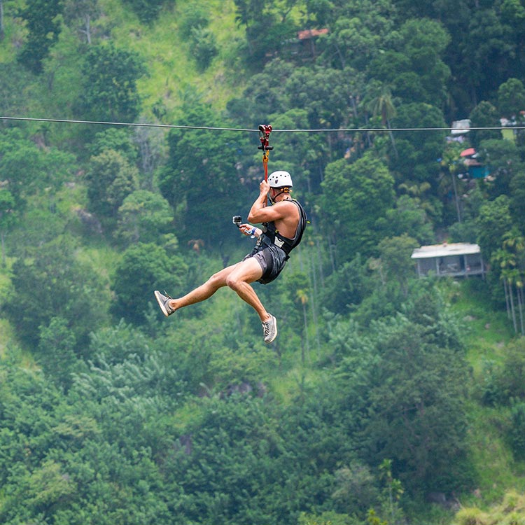 A Foreigner Experiencing Zip Lining in Sri Lanka
