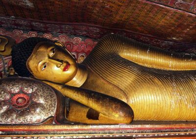 The Golden Reclining Buddha Statue at the Dambulla Cave Temple