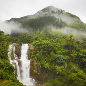 A Waterfall in Nuwara Eliya cascading through the greenery