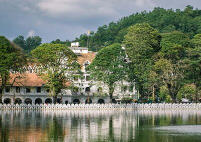 The white palace of the temple of the tooth relic, Bogambara lake and the greenery around at the ancient town of Kandy