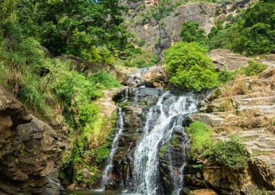 The Ravana Falls cascade over the rocky terrains