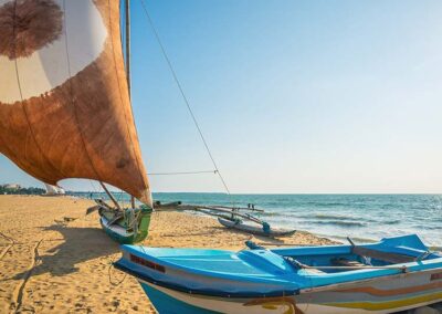 A yacht and a boat on the shores of Negombo