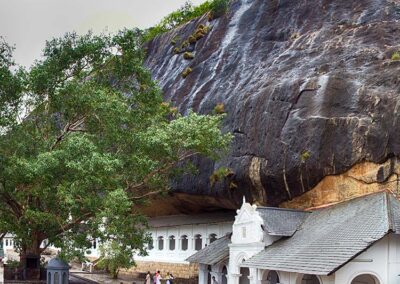 The white building, caves, and the ground area of the Dambulla cave temple